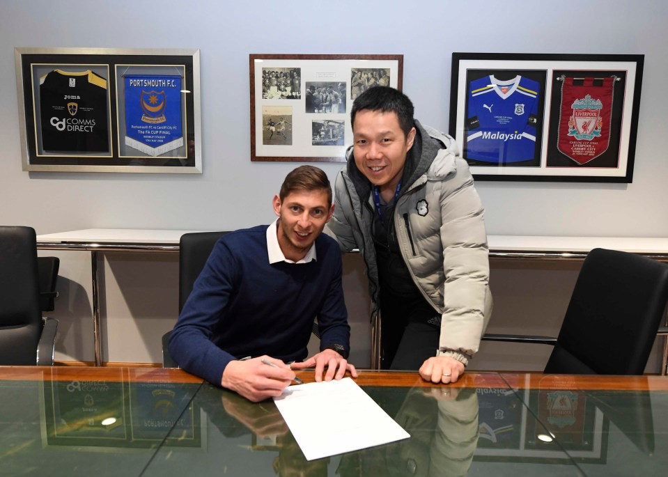 Sala signs on the dotted line for Cardiff with the club's CEO Ken Choo