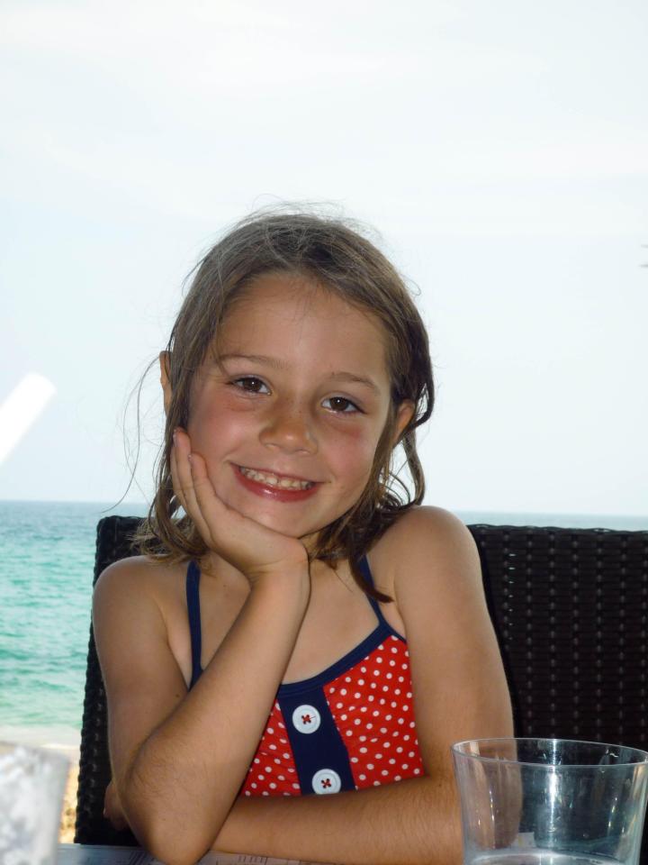  A young Molly smiles for the camera in 2009 - eight years before she took her own life