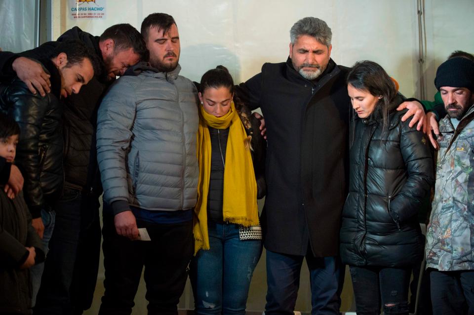  The parents of two-year-old Julen Rosello are surrounded by relatives in Totalan, southern Spain