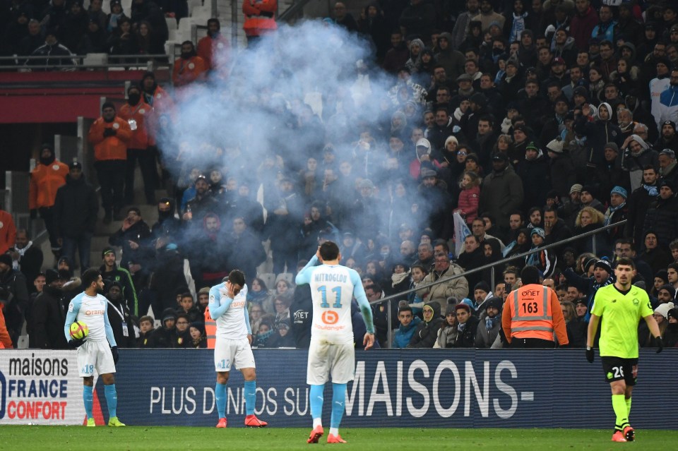 The Ligue 1 clash between Marseille and Lille was stopped for more than 30 minutes due to a firecracker on the pitch