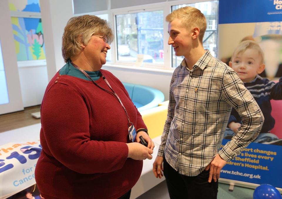  Andrew, pictured with staff at the hospital who helped him as a teen