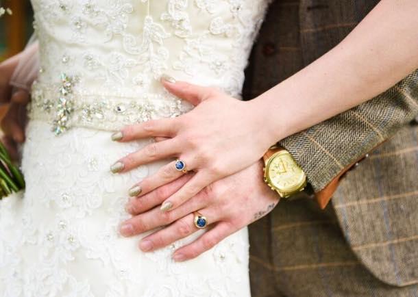 The couple of their dead son Riley’s ashes made into wedding rings for their big day under a year later