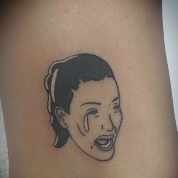  A Kim Kardashian meme has been made into a body art for one fan