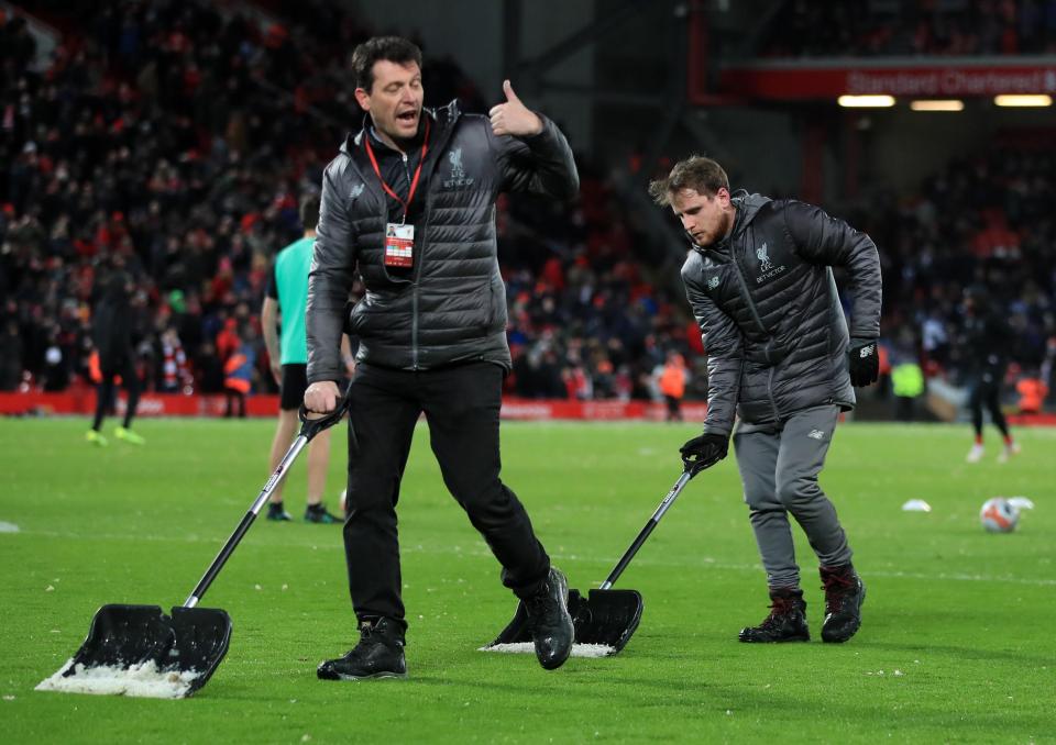  Liverpool stewards cleared the pitch of snow at half-time... but only at one end of the stadium