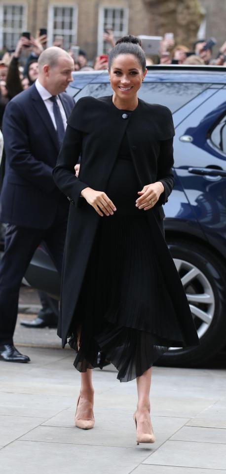  The Duchess of Sussex beamed as she headed to the ACU, a patronage she received from the Queen