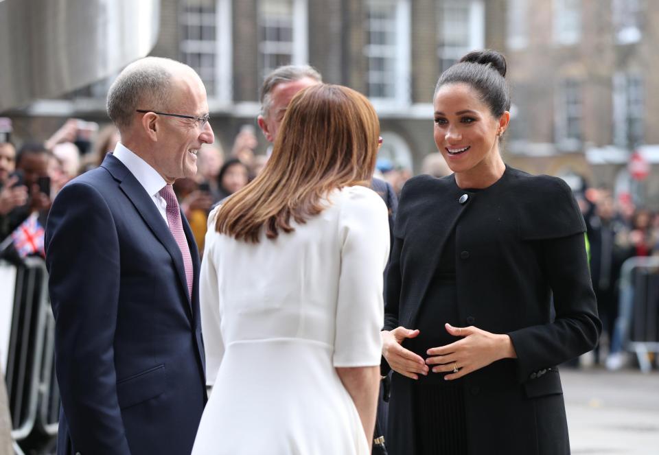  The duchess smiles as she is welcomed to the university in London