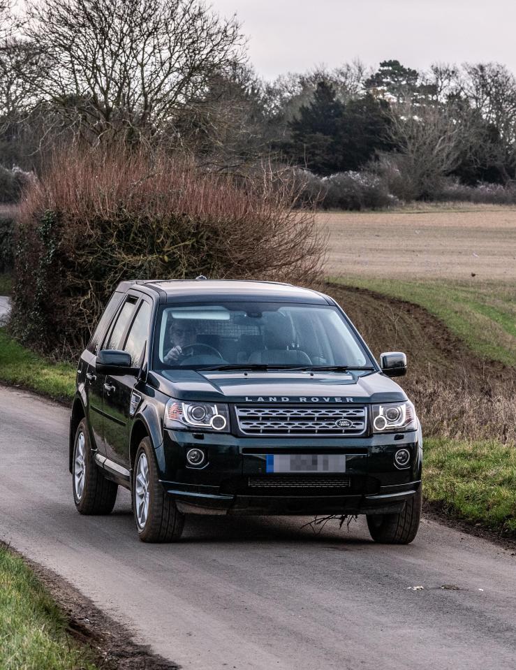  Prince Philip driving on the Sandringham Estate, Norfolk, in his Land Rover