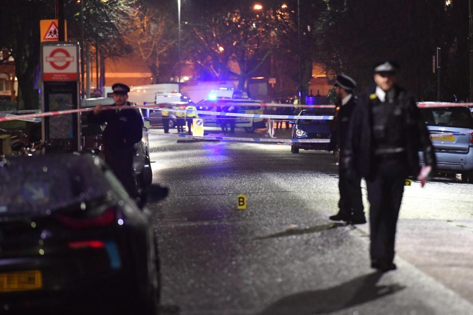 Police officers cordoned off a street near Prince George's school in Battersea last night