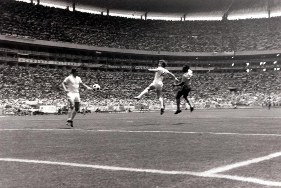  Pele climbs high to power in his head down into the bottom corner of the England goal