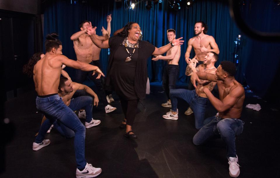  The male strippers prompted Alison to get up and join them for a dance