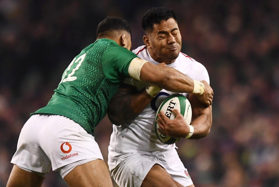 Manu Tuilagi smashes through the Ireland backs