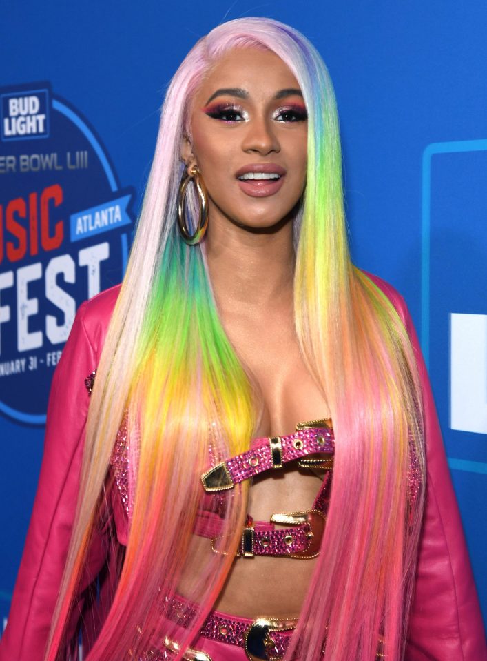  At the Big Light Super Bowl Music Fest in Atlanta Cardi wore a rainbow wig and pink leather