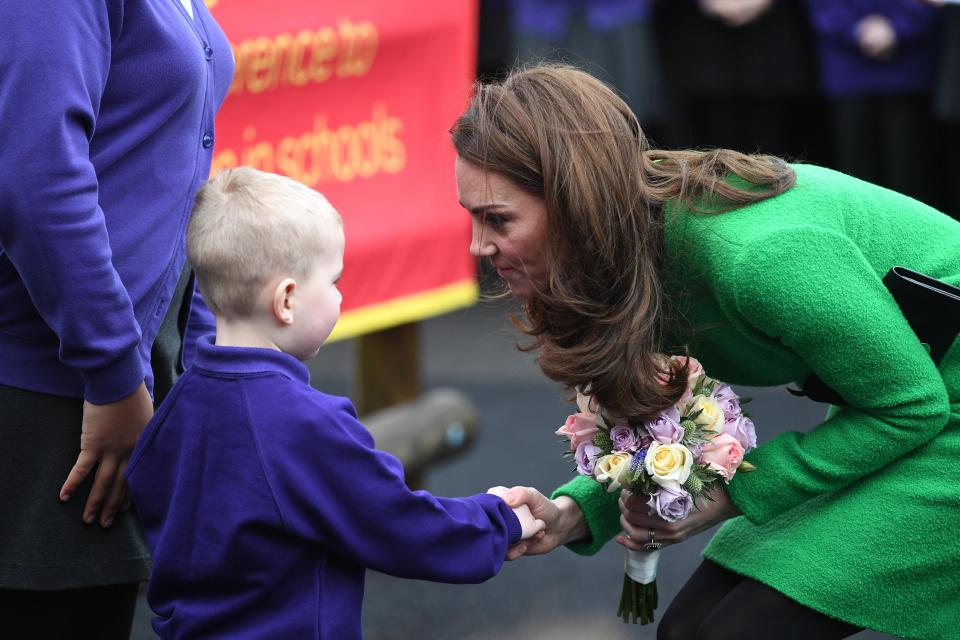  The Duchess of Cambridge bent down to shake hands with an adorable pupil at Lavender Primary School