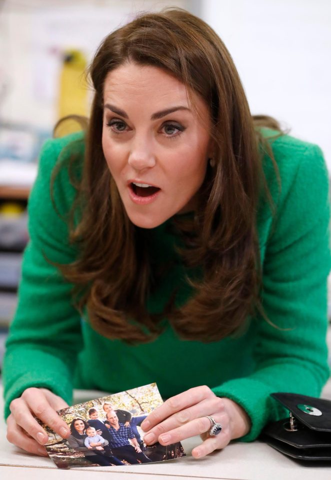  Kate Middleton brought along a picture of her and her family to show pupils at the school visit this morning