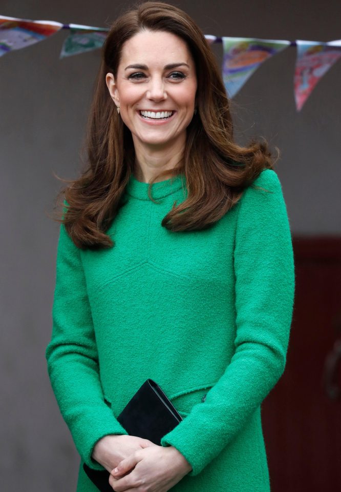  Kate looked happy and relaxed as she embarked on two school visits today