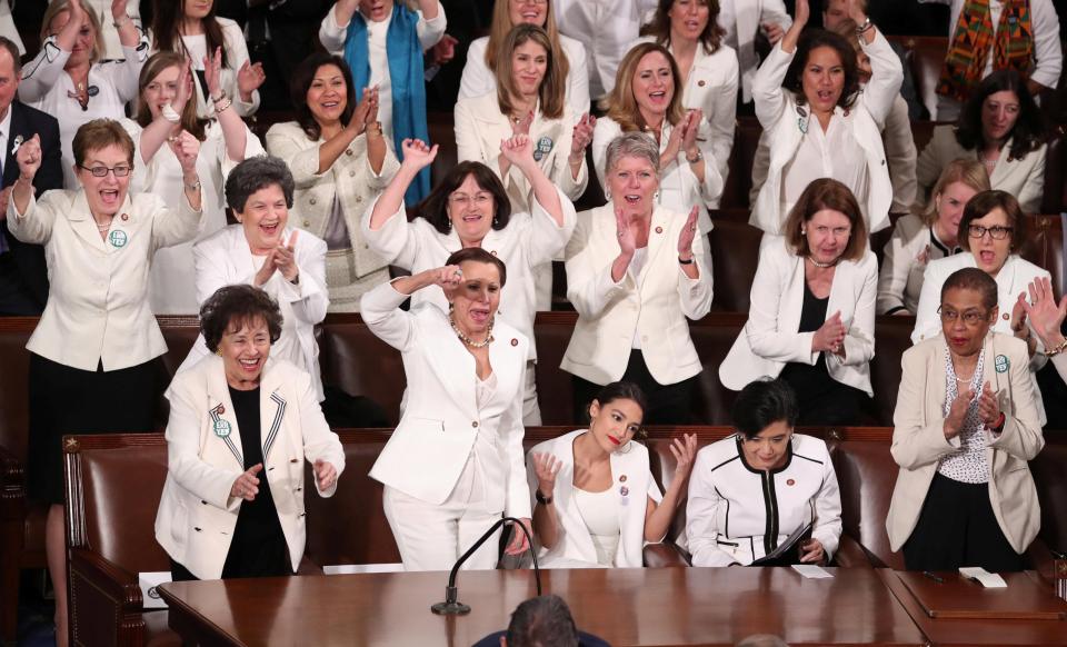  Female members cheer after Trump said there are more women in Congress than ever before