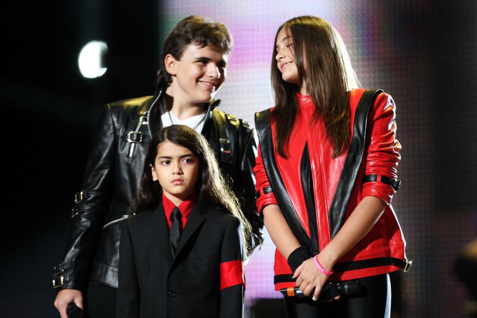  Jackson's three children, including Blanket, centre, appear on stage at the Michael Forever Tribute Concert in Cardiff, Wales, in 2011