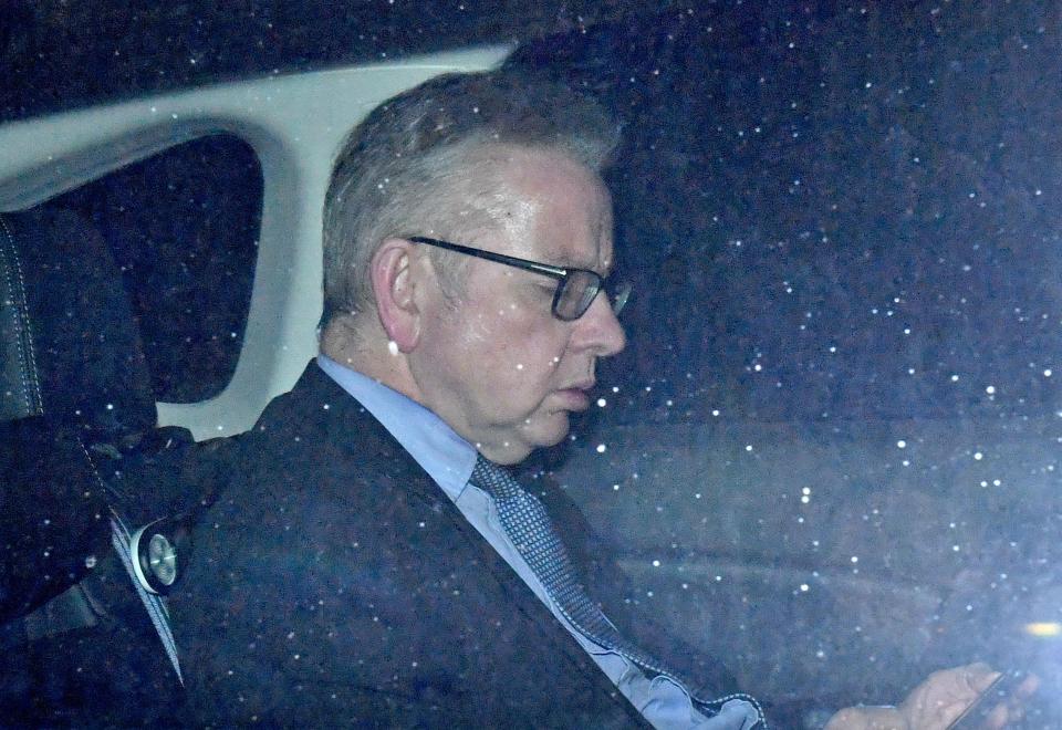  Environment Secretary Michael Gove in one of the cars dropping off people