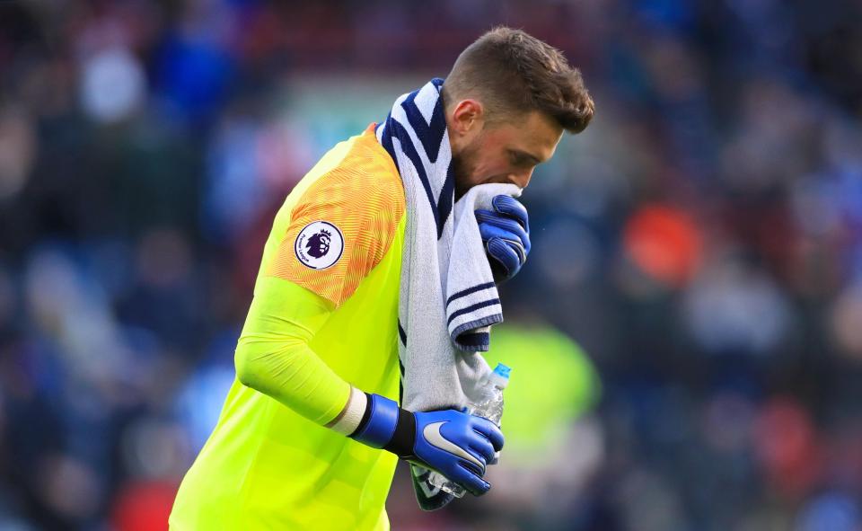  Huddersfield goalkeeper Ben Hamer leaves the pitch at half-time