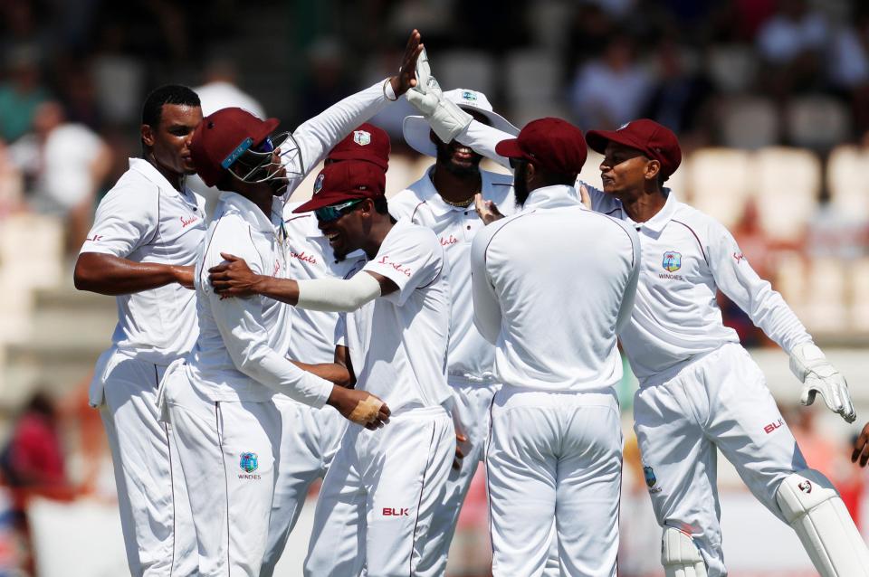  West Indies celebrate taking the wicket of Joe Denly