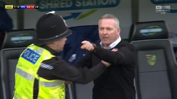 Paul Lambert had to be restrained by a police officer after a furious bust-up with the Norwich coaching staff