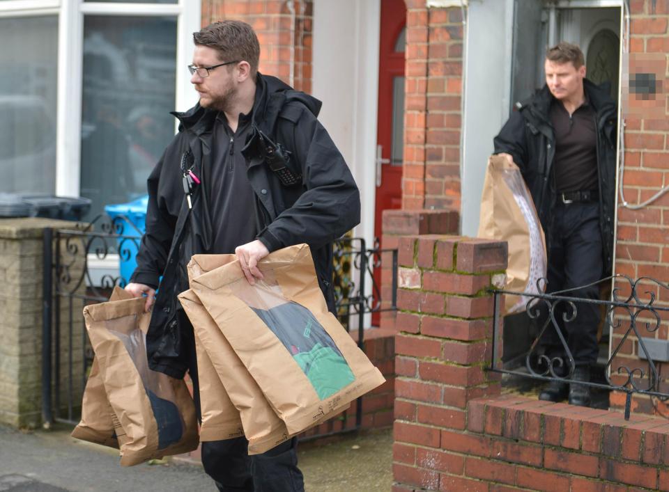  Police were seen removing evidence bags and were said to have seized Rełowicz's laptop computer after searching his home in February