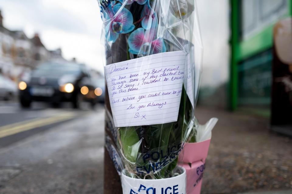  Floral tributes have been left at the scene