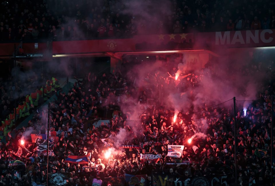 The travelling PSG fans lit up the Old Trafford skyline with flares before kick off