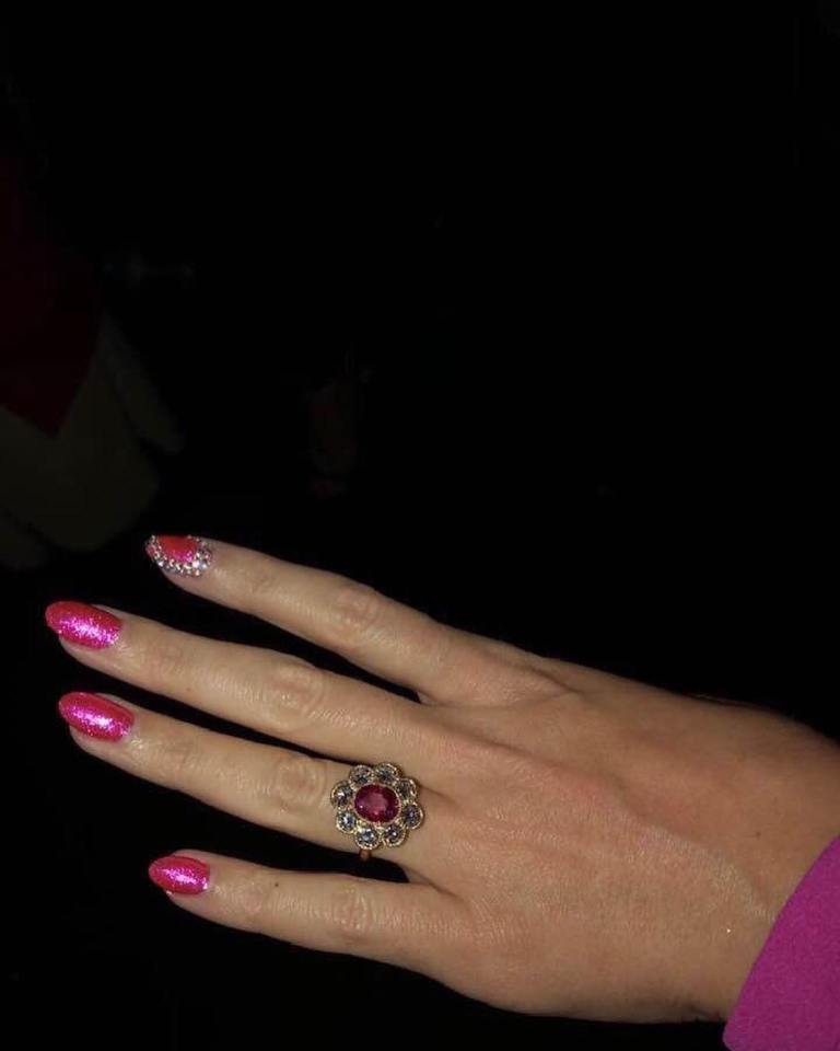  The popstar shows off her unusual 'engagement ring'