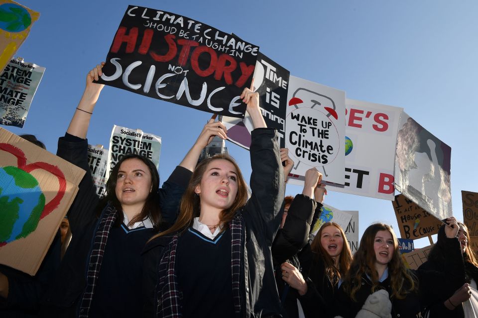  Students were seen dressed in their uniform as they marched the streets of London