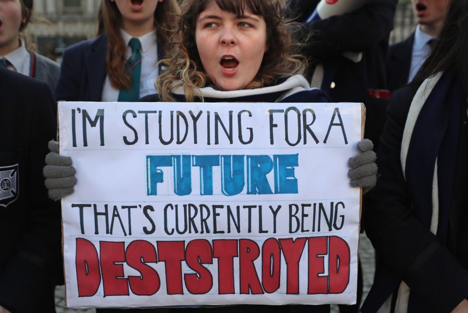  In Belfast a protester fails to spell-check their sign for demo