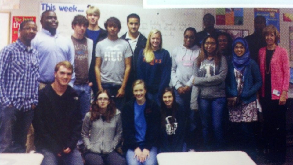  Hoda Muthana, at right in the head scarf, poses for a photo with her 11th-grade English class at Hoover High School in Hoover, Alabama