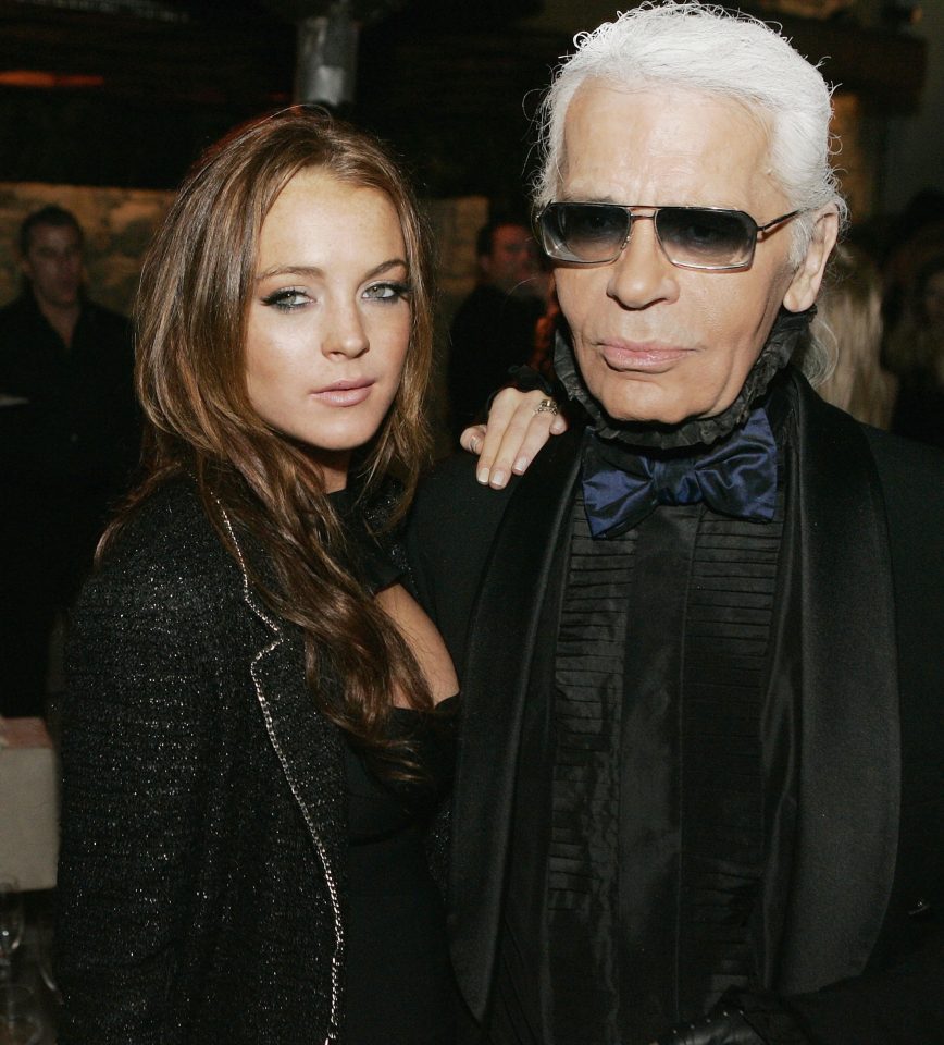  Here he poses for a photo with Lindsay Lohan