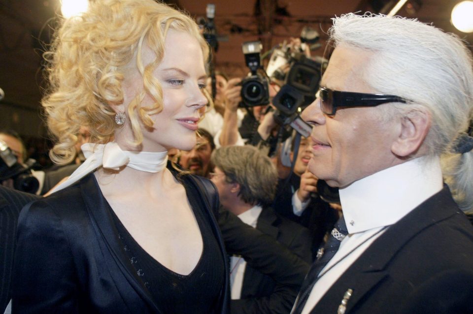  Actress Nicole Kidman greets Lagerfeld at the Chanel Spring/Summer show in Paris in 2004