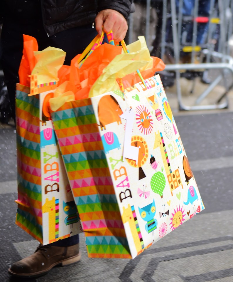 Blizzard like conditions did not prevent guests from arriving in style, and bearing gifts for the royal baby