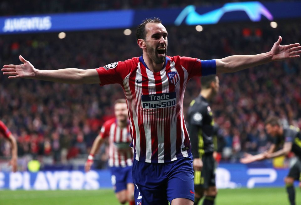  Captain Diego Godin led by example to double his side's lead with seven minutes remaining