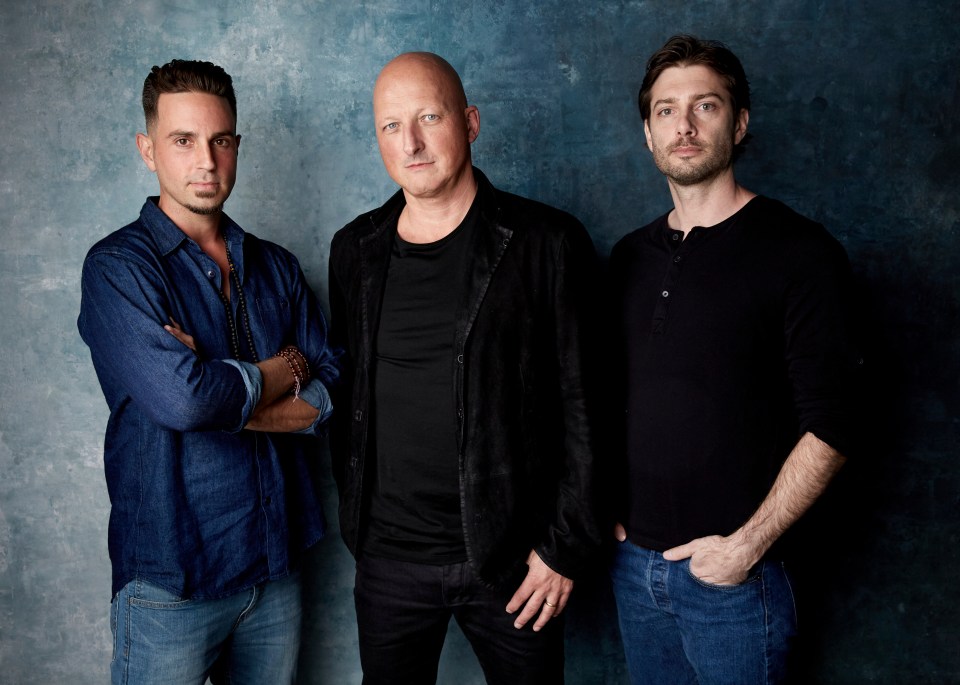 Wade Robson, from left, director Dan Reed and James Safechuck pose for a portrait to promote the film 'Leaving Neverland'