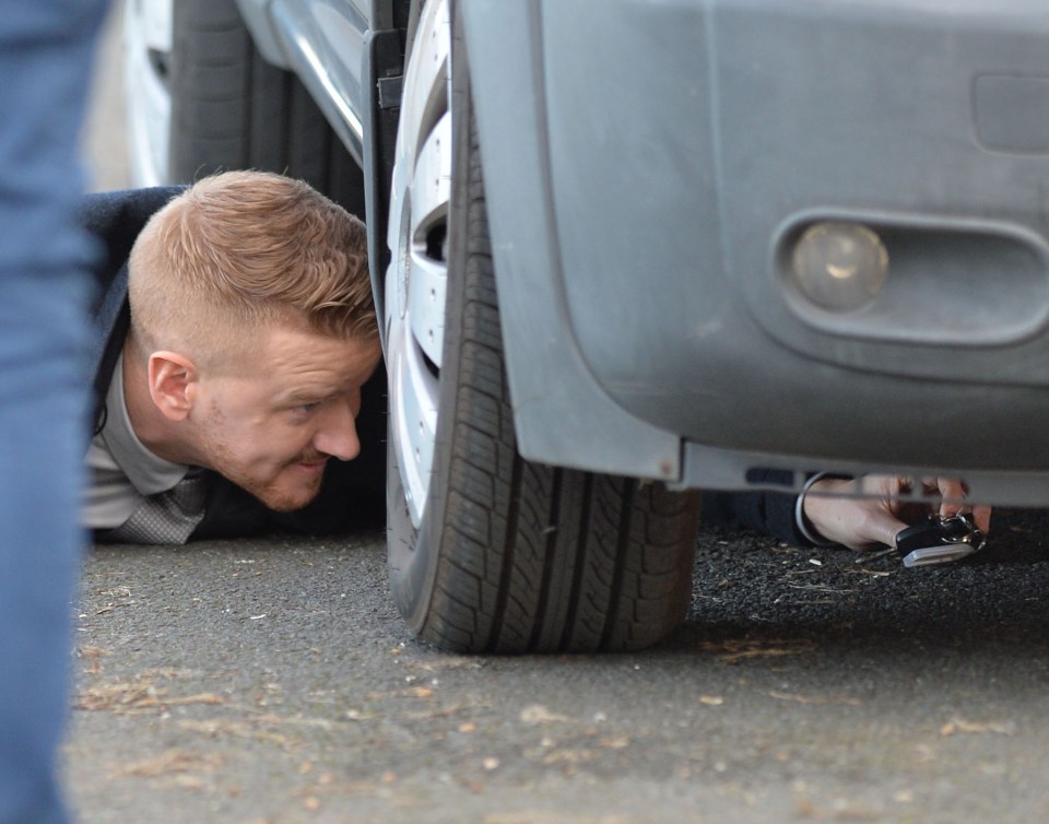  Gary drops his keys as he makes his way to the van