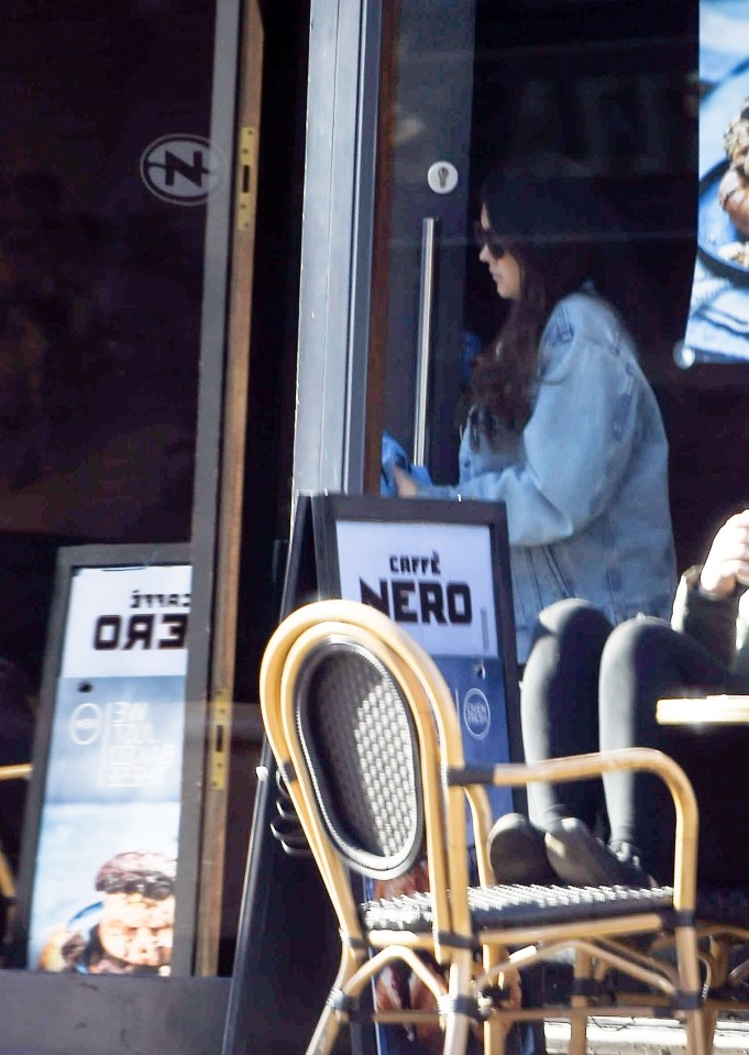  The mother-to-be pops into Cafe Nero during her outing