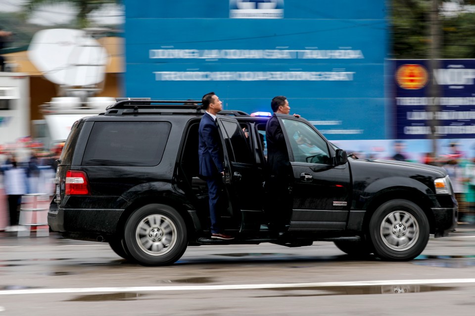 North Korean bodyguards in the motorcade follow their ‘Glorious Leader’