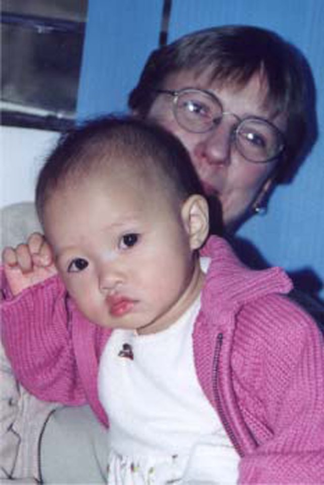  The Mausers adopted baby Madeline from China in Daniel's memory