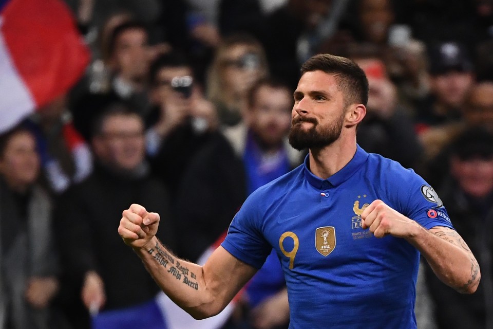  Olivier Giroud celebrates after scoring for France against Iceland