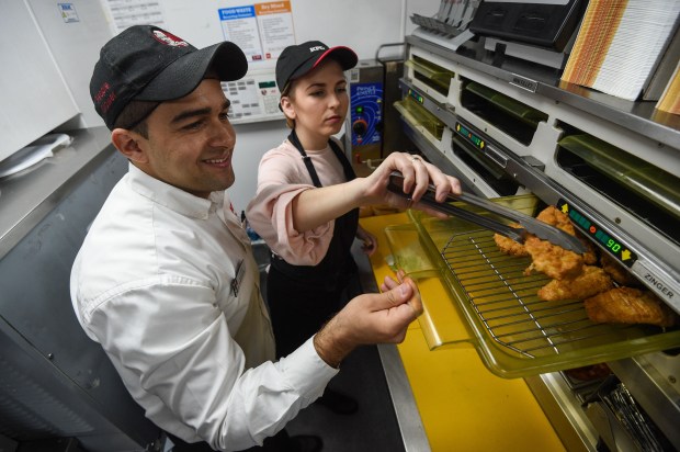 Customers can try their hands at frying chicken in KFC kitchens