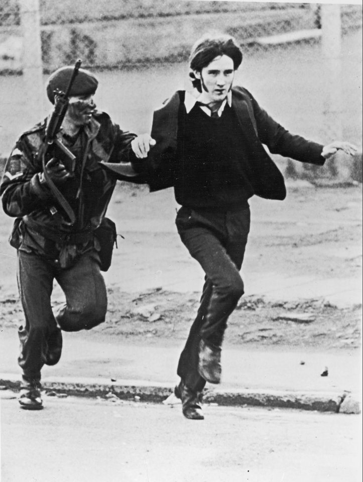  A British paratrooper takes a captured youth from the crowd on Bloody Sunday