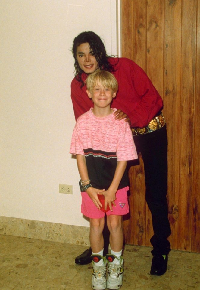  Michael with Macaulay Culkin who he befriended in 1990