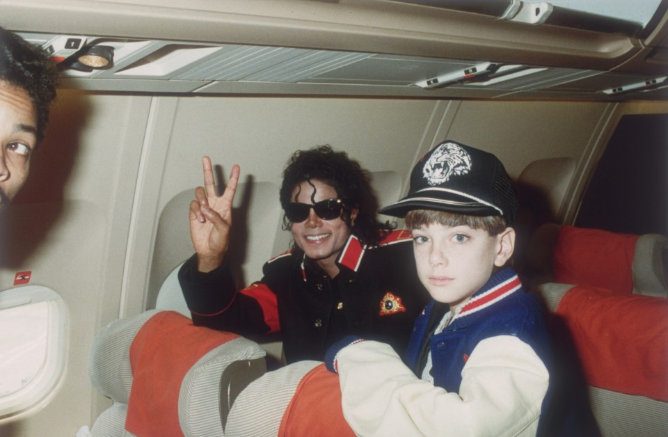  Michael Jackson with 10-year-old Jimmy Safechuck on his tour plane in 1988