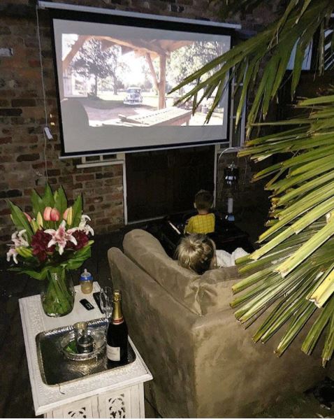  The couple also watch movies outside when the weather is warm