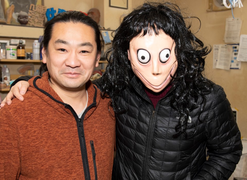  Aiso with someone wearing a Momo mask, bought in Mexico, at his Tokyo factory