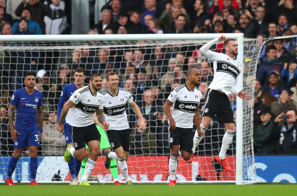  Chambers (far right) celebrates scoring against Chelsea