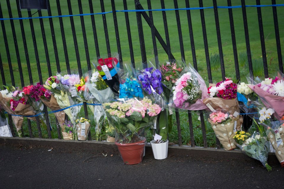  Tributes attached to a fence close to where the teen was stabbed